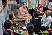Family of Slain Sena (UBT) Leader Purnekar Demands CBI Probe, Cites Fears Of Political Interference | Photo: PTI : Shiv Sena (UBT) chief Uddhav Thackeray interacts with family members of party division chief Pradeep Purnekar during a condolence visit at their residence in Thane, Thursday, Oct. 1, 2026. Purnekar was shot dead at his office in Manpada on September 29, triggering local protests and political tension across the area.