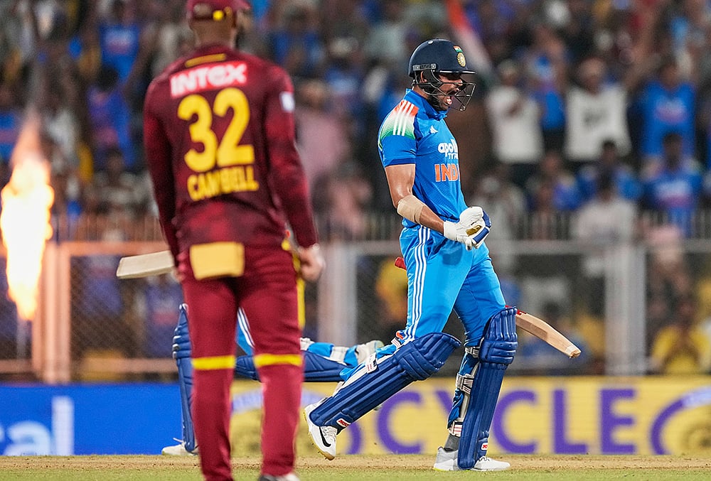Shubman Gill celebrates after scoring a double century
