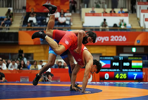 India's Sunil Kumar, top, and Philippines's Callum Johnston Roberts compete in their men's greco-roman 87kg bronze medal wrestling match at the Asian Games in Nagoya, Japan, Wednesday, Sept. 30, 2026. 