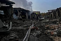 In Photos: War Rages On Between Russia And Ukraine | Photo: Ukrainian Emergency Service via AP : Rescuers put out a fire affecting garages destroyed after a Russian drone strike on Kyiv region, Ukraine.