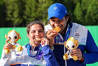 Neeru Dhanda And Kynan Chenai Shoot Record 34 To Win Trap Mixed Team Gold At Asian Games 2026 | Photo: PTI/Atul Yadav : Gold medallist India's Neeru Dhanda, left, and Kynan Chenai pose for photographers during the medal ceremony after the trap mixed team shooting event at the 20th Asian Games, in Nagoya, Japan.