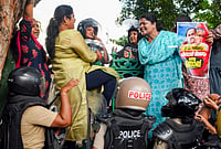 Day In Pics: October 01, 2026 | Photo: PTI : Mahila Morcha activists scuffle with police personnel near the State Secretariat during a protest, in Thiruvananthapuram. The protest was organized in response to Youth Congress workers waving black flags at Union Home Minister Amit Shah's convoy during his visit to Kollam.
