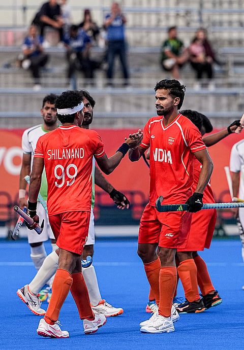 India's Shilanand Lakra, 99, and Abhishek, 5, reacts during a men's semifinal hockey match between India and Pakistan, at the ongoing 20th Asian Games, in Kakamigahara, Japan, Thursday, Oct. 1, 2026. 