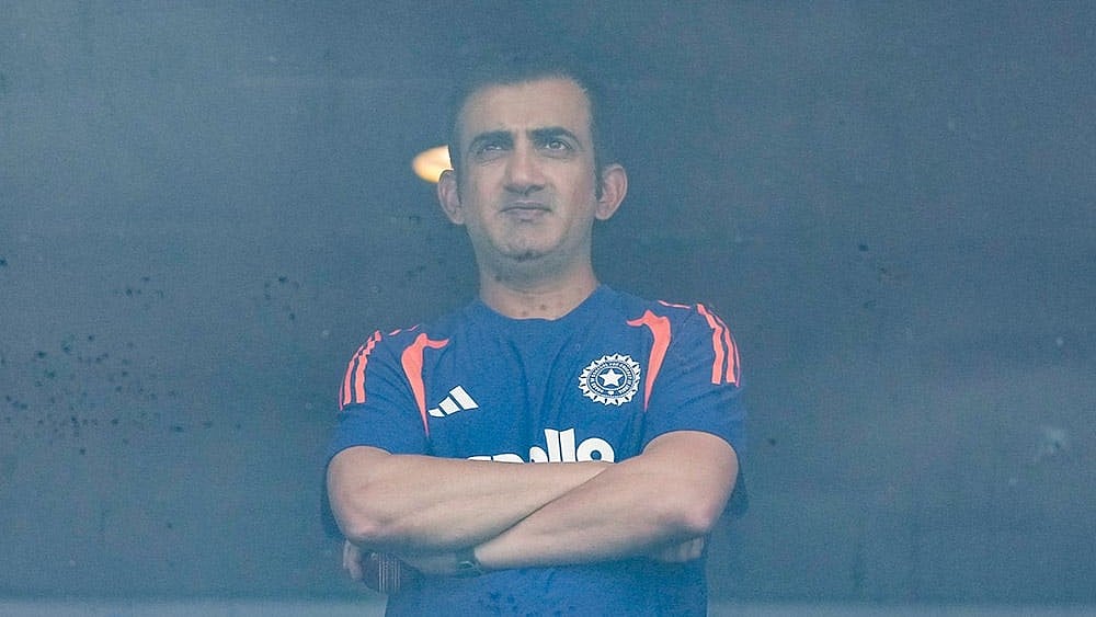 India's coach Gautam Gambhir waits amid match delay during Day 2 of the first Test cricket match between India and Sri Lanka, in Galle, Sri Lanka. - | Photo: PTI/Shailendra Bhojak