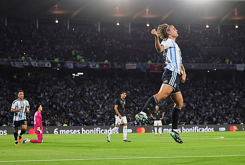 Argentina's Nico Paz celebrates scoring his side's second goal against Bolivia during an international friendly soccer match in Cordoba, Argentina, Wednesday, Sept. 30, 2026. 