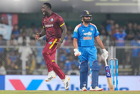 West Indies' Jayden Seales, left, celebrates the wicket of India's Rohit Sharma, right, during the second one-day international cricket match between India and West Indies in Guwahati, India, Wednesday, Sept. 30, 2026.