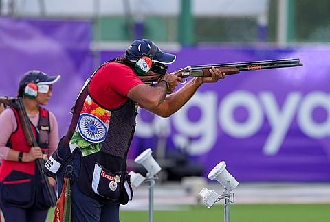 India's Kynan Chenai competes during the trap mixed team shooting event at the 20th Asian Games, in Nagoya, Japan, Wednesday, Sept. 30, 2026. 