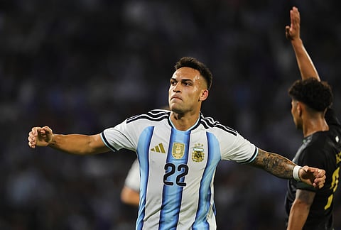 Argentina's Lautaro Martinez celebrates scoring his side's first goal against Bolivia during an international friendly soccer match in Cordoba, Argentina, Wednesday, Sept. 30, 2026. 