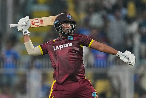 West Indies' Amir Jangoo celebrates his century during the second one-day international cricket match between India and West Indies in Guwahati, India, Wednesday, Sept. 30, 2026.

