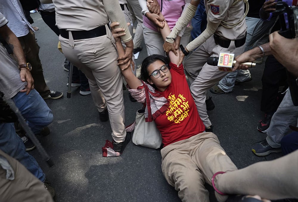 All India Students Association (AISA) National President Neha Bora being detained during a protest carried out by political parties and members of AISA, SFI, NSUI and other student bodies against Chief Election Commissioner (CEC) Gyanesh Kumar, demanding his resignation over the alleged irregularities in the Special Intensive Revision (SIR) of electoral rolls and mass deletion of voters, at Jantar Mantar, in New Delhi, Friday, Oct. 2, 2026.