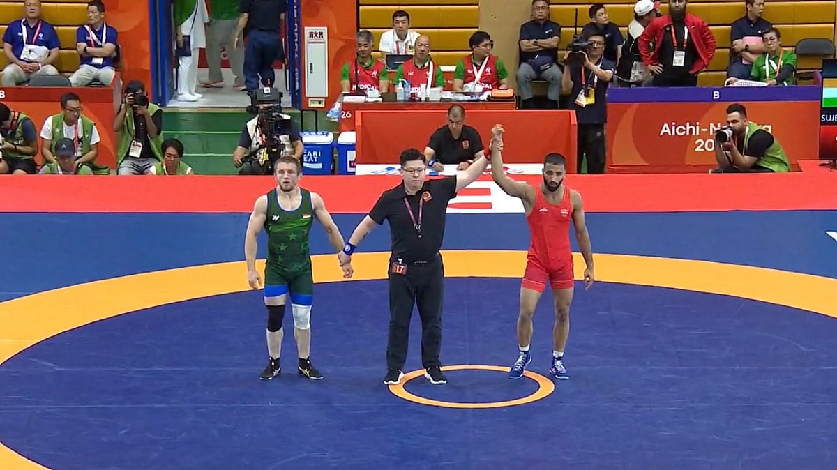 Sujeet Kalkal Pulls Off Incredible 2-9 Comeback To Win Asian Games 2026 Wrestling Gold - X/TheKhelIndia