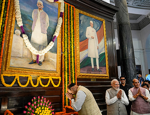 Lok Sabha Speaker Om Birla pays tribute to former prime minister Lal Bahadur Shastri on his birth anniversary, at the Central Hall of Samvidhan Sadan, in New Delhi, Friday, Oct. 2, 2026. Prime Minister Narendra Modi and Defence Minister Rajnath Singh are also seen. 
