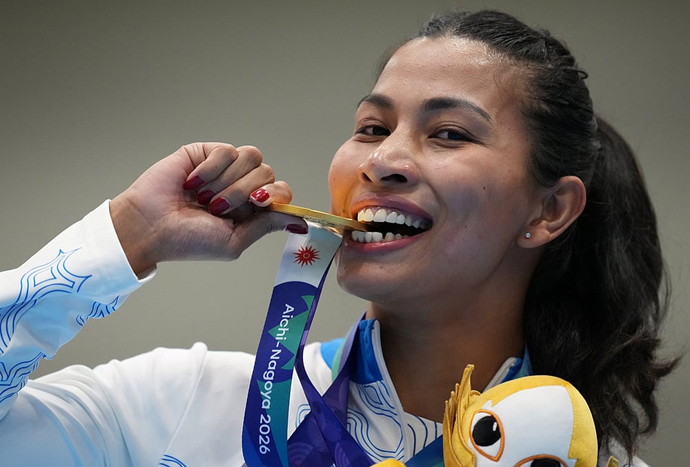 India's Lovlina Borgohain poses with her gold medal during the medal ceremony for the women's 75kg boxing final match at the Asian Games in Nishio, Aichi prefecture, Japan, Friday, Oct. 2, 2026.  - | Photo: AP/Lee Jin-man
