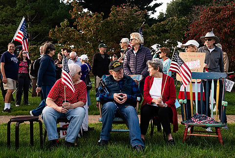 Demonstrators gather at Memorial Circle to protest the proposed Triumphal Arch, Thursday, Oct. 1, 2026, in Arlington, Virginia.
