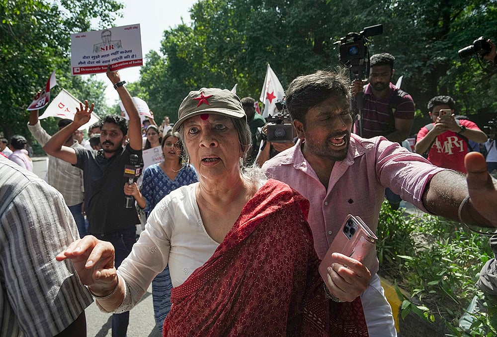 CPI(M) leader Brinda Karat takes part in a protest 