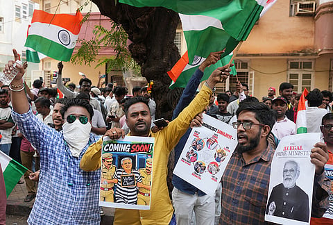 Supporters of the Cockroach Janta Party hold placards and shout slogans as they arrive to take part in a protest against Chief Election Commissioner Gyanesh Kumar and call for the suspension of the Special Intensive Revision (SIR) of electoral rolls in Mumbai, Friday, Oct. 2, 2026. 
