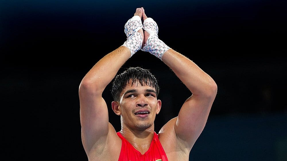 India's Ankush Panghal  defeated Kim Min-seong 4-0 to win the gold medal at the Asian Games 2026, on Friday, October 2. - Photo: PTI/Ravi Choudhary