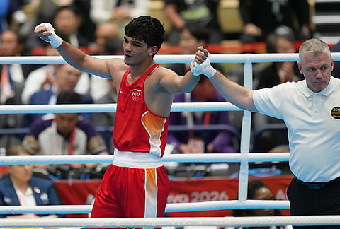 India's Ankush celebrates his win over South Korea's Kim Min-seong in their men's 80kg boxing final match at the Asian Games in Nishio, Aichi prefecture, Japan, Friday, Oct. 2, 2026. 