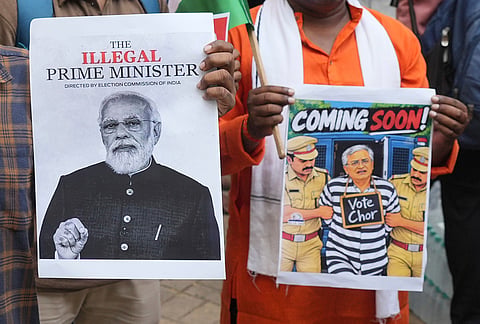 Supporters of the Cockroach Janta Party hold placards as they arrive to take part in a protest against Chief Election Commissioner Gyanesh Kumar and call for the suspension of the Special Intensive Revision (SIR) of electoral rolls in Mumbai, Friday, Oct. 2, 2026. 
