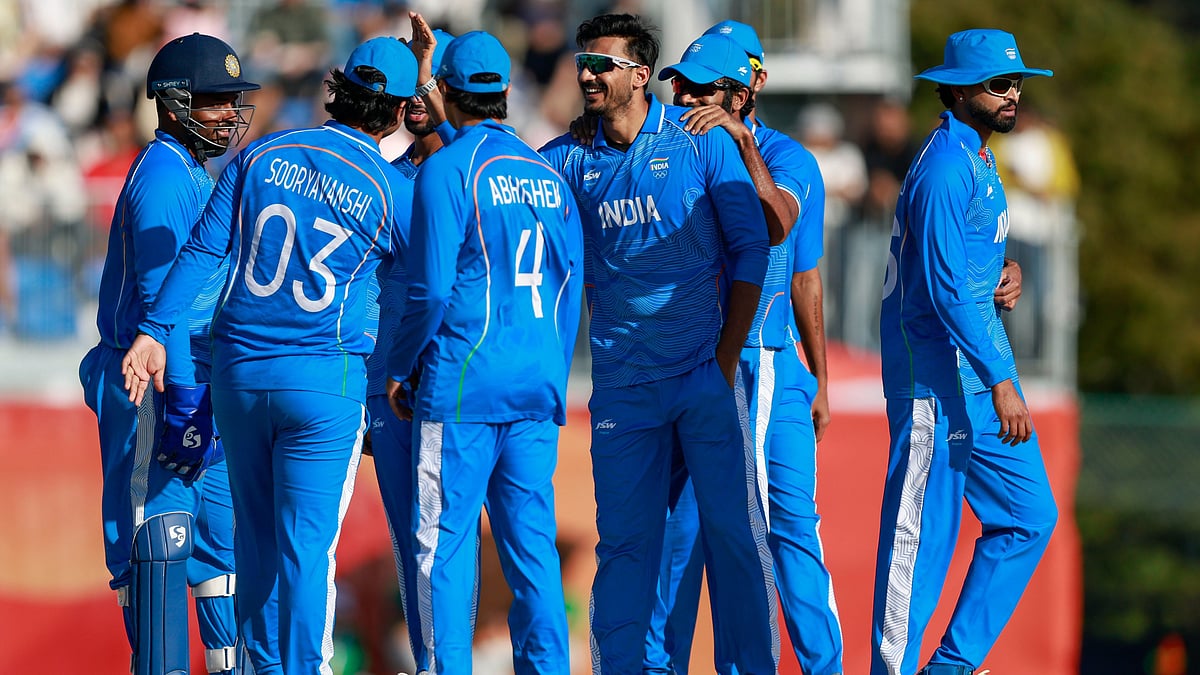 Indian cricketers celebrate a wicket during Asian Games 2026 semi-final against Sri Lanka.  - BCCI/X