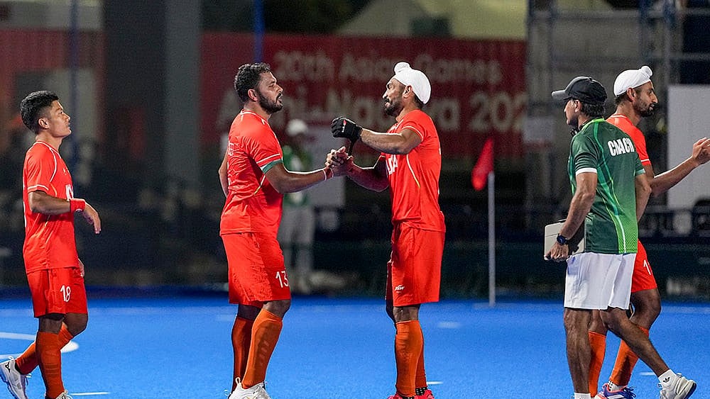 India's captain Harmanpreet Singh, second left, Jugraj Singh, centre, Nilakanta Sharma, left, and others celebrate after winning the men's semifinal hockey match between India and Pakistan, at the ongoing 20th Asian Games, in Kakamigahara, Japan, Thursday, Oct. 1, 2026.  - | Photo: PTI/Atul Yadav