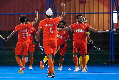 India's players celebrate their goal against Malaysia during the men's hockey final match at the Asian Games in Gifu, Japan, Saturday, Oct. 3, 2026. 
