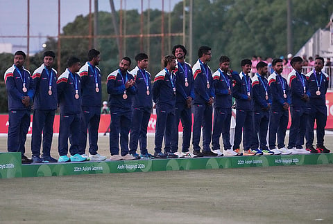 Bronze medalists Sri Lanka team members pose on the podium during the medal ceremony for cricket at the Asian Games in Nagoya, Japan, Saturday, Oct. 3, 2026.
