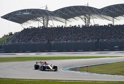 Red Bull driver Isack Hadjar of France steers his car during the qualifying session ahead of the Bahrain Grand Prix in Sepang, Malaysia, Saturday, Oct. 3, 2026. 