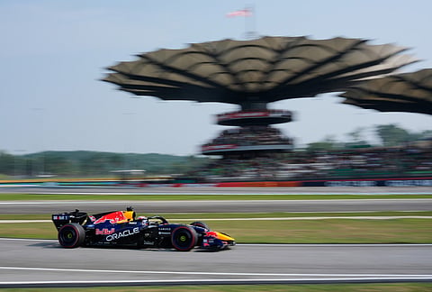 Red Bull driver Max Verstappen of the Netherlands steers his car during the qualifying session for the Bahrain Grand Prix in Sepang, Malaysia, Saturday, Oct. 3, 2026. 
