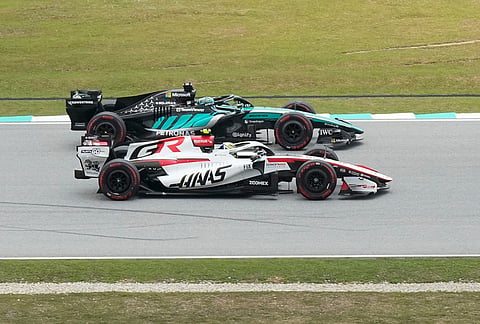 Mercedes driver George Russell of Britain is flanked by Haas driver Oliver Bearman of Britain steers his car during the third practice session ahead of the Bahrain Grand Prix in Sepang, Malaysia, Saturday, Oct. 3, 2026. 
