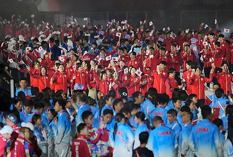Athletes from the Japan march into the arena during the closing ceremony for the Asian Games in Nagoya, Japan, Sunday, Oct. 4, 2026.
