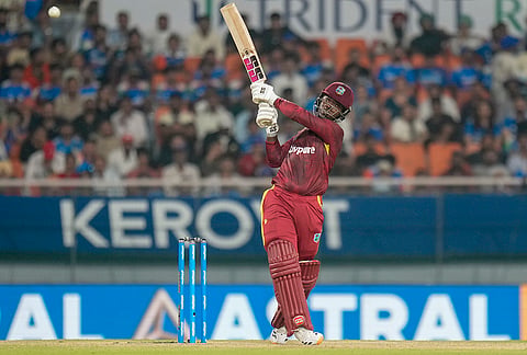 West Indies' Sherfane Rutherford plays a shot during the third and final One Day International (ODI) cricket match of a series between India and West Indies, in Mullanpur, Saturday, Oct. 3, 2026. 