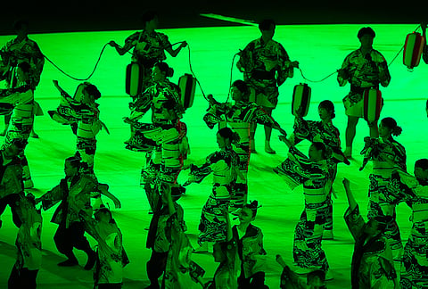Dancers perform during the closing ceremony for the Asian Games in Nagoya, Japan, Sunday, Oct. 4, 2026. 
