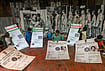 | Photo: PTI  : Artists and club members finish installation of giant replicas of Aadhar and voter identity cards of legendary poet Rabindranath Tagore, former president and scientist APJ Abdul Kalam and Mother Teresa, amid preparations for the 'Durga Puja' festival, at 'Humanity' themed Khidirpur Jubak Sangha community pandal, in Kolkata, West Bengal.
