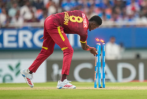 West Indies' Alzarri Joseph runs out India's Anshul Kamboj during the third and final One Day International (ODI) cricket match of a series between India and West Indies, in Mullanpur, Saturday, Oct. 3, 2026. 