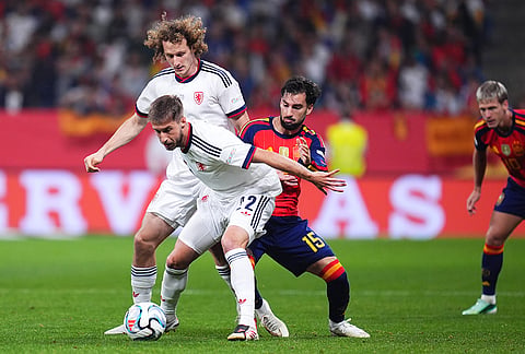 Spain's Alex Baena, right, challenges Czechia's Michal Sacek during the UEFA Nations League soccer match between Spain and Czechia in Oviedo, Spain, Saturday, Oct. 3, 2026.  

