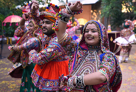 Artists wearing traditional attire practice the Garba, a traditional dance of Gujarat state, during a rehearsal of Navratri, or the nine night Hindu festival, in Ahmedabad, India, Sunday, Oct. 4, 2026.  
