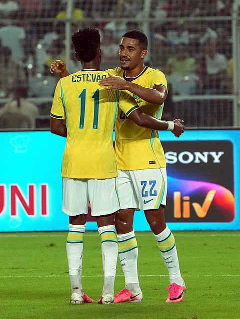 Brazil's Samuel Lino, 22,  celebrates with Estevao after scoring a goal during an International friendly Football match between India and Brazil, in Kolkata, Saturday, Oct. 3, 2026. 