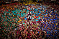 | Photo: AP/Emilio Morenatti : Members of Castellers de Lleida form a "castell" human tower during the 30th Concurs de Castells, or Human Tower Competition, in Tarragona, Spain, Saturday, Oct. 5, 2026. 
