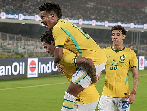 Brazil's Pedro celebrates with Estevao Willian after scoring the team's second goal during an International friendly Football match between India and Brazil, in Kolkata, Saturday, Oct. 3, 2026. 