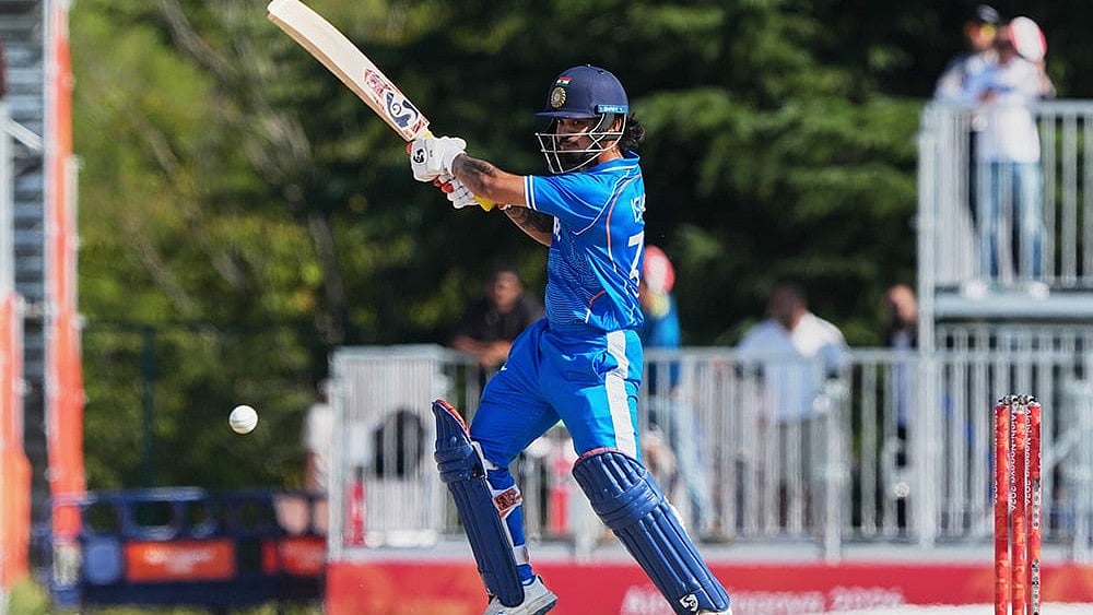 India's Ishan Kishan hits a shot during the gold medal cricket match between India and Pakistan at the Asian Games in Nagoya, Japan, Saturday, Oct. 3, 2026.
 - | Photo: AP/Mark Baker