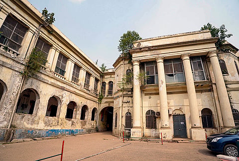 A view of the south wing of the Bankipore General Hospital building at Patna Medical College and Hospital (PMCH), in Patna, Bihar. The north wing of the structure, which housed the Hathwa Ward, was demolished as part of an ongoing redevelopment project. 
