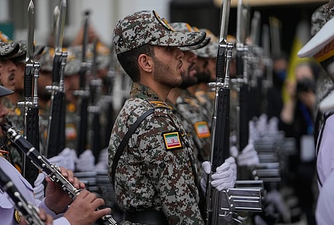Iranian army cadets sing the national anthem during the opening ceremony of one of the military training centers for volunteers being set up throughout squares in downtown Tehran, Iran, Saturday, Oct. 3, 2026. 
