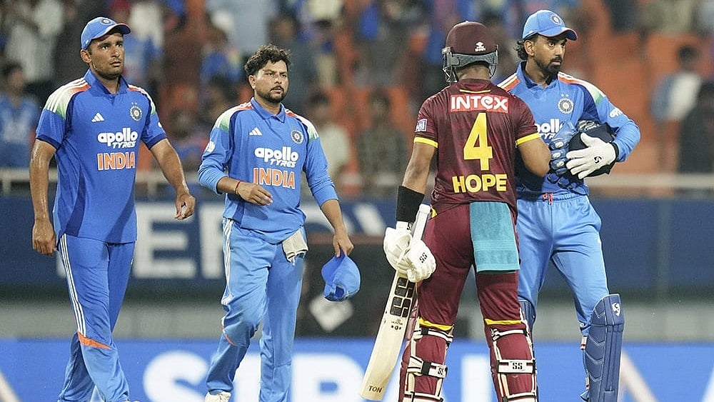 West Indies' Shai Hope, second right, greets India's K L Rahul after winning the third and final One Day International (ODI) cricket match of a series between India and West Indies, in Mullanpur, Saturday, Oct. 3, 2026.  - | Photo: PTI/Ravi Choudhary