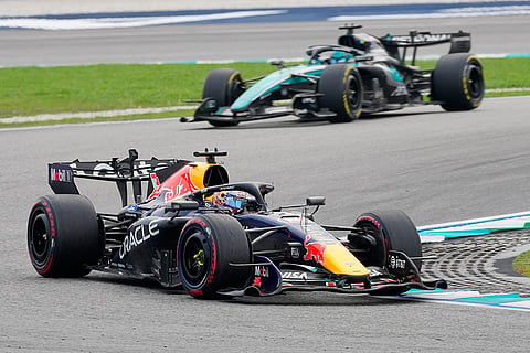 Red Bull driver Max Verstappen of the Netherlands steers his car ahead of Mercedes drivers George Russell of Britain during the Bahrain Grand Prix in Sepang, Malaysia, Sunday, Oct. 4, 2026.