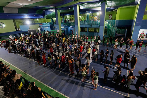 Voter line up at a polling station during general elections in Rio de Janeiro, Sunday, Oct. 4, 2026.