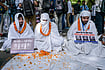 Day In Pics: October 05, 2026 | Photo: PTI : National Students' Union of India (NSUI) national president Vinod Jakhar, right, along with members wrapped in white sheets and holding placards stage a protest demanding the resignation and arrest of Chief Election Commissioner (CEC) Gyanesh Kumar over allegations of ‘vote chori’, at NSUI headquarters on Raisina Road, in New Delhi.