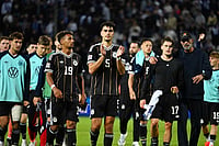 Valiant Defensive Masterclass For Greece Secure Historic 0-0 Stalemate Against Germany In Thessaloniki | Photo: AP/Giannis Papanikos : Germany's Aleksandar Pavlovic, centre, applauds to fans with tammates after the UEFA Nations League soccer match between Greece and Germany in Thessaloniki, northern Greece, Sunday, Oct. 4, 2026.