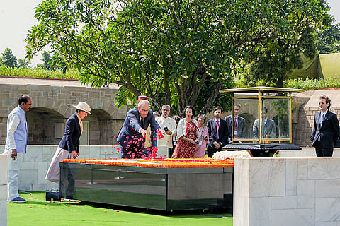In this image posted on Oct. 5, 2026, Swiss Confederation’s President Guy Parmelin pays homage to Mahatma Gandhi, at Rajghat in New Delhi.
