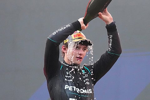 Mercedes driver Andrea Kimi Antonelli of Italy celebrates his second place on the podium the Bahrain Grand Prix in Sepang, Malaysia, Sunday, Oct. 4, 2026.